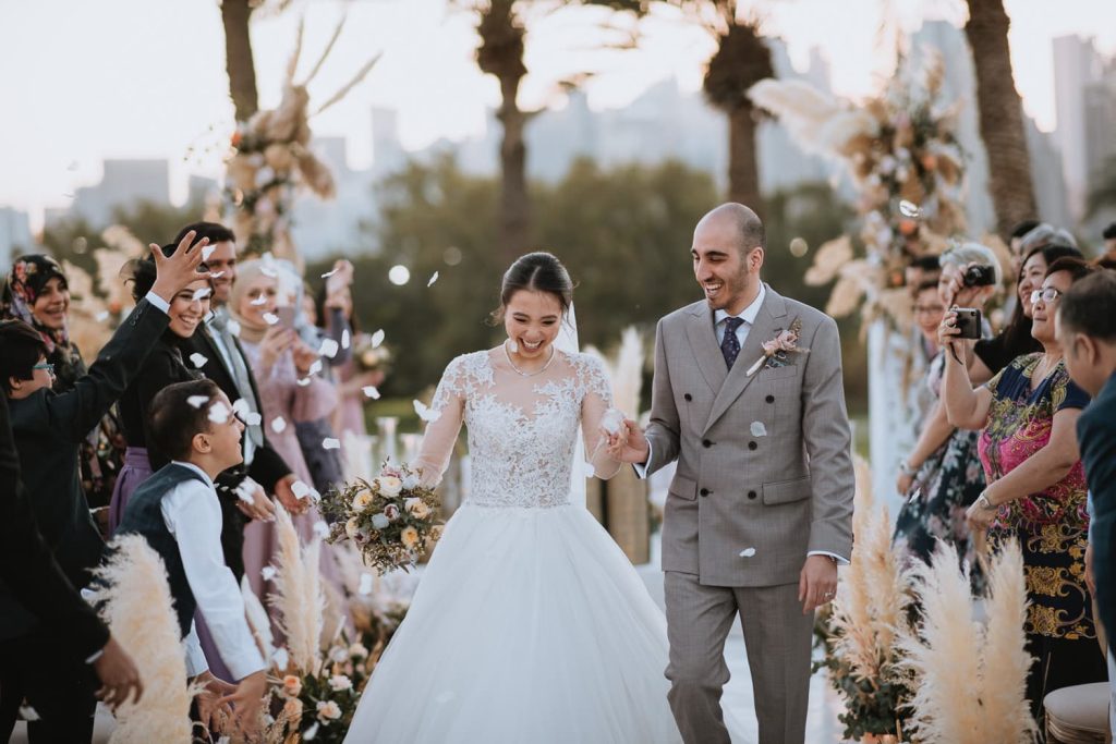 Wedding photography in Dubai for outdoor ceremonies featuring luxury beach, desert, and garden wedding photos in the UAE